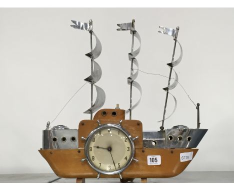 An Art Deco mantle clock modelled as a three masted galleon.
