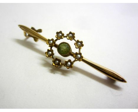 15ct. Gold Seed Pearl &amp; Peridot Bar Brooch, central peridot surrounded by floral set seed pearls 