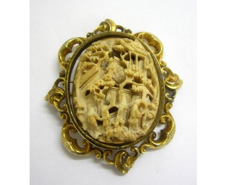 C19th Victorian Chinese (Cantonese) Ivory Carved Brooch, deep relief figures on the veranda, pagoda roof buildings, cherry bl