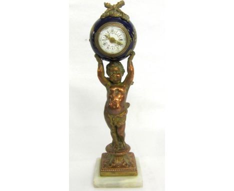 C19th Small Pillar Clock with onyx bevelled base, cast copper figure partially gilded cherub holding aloft porcelain globe su