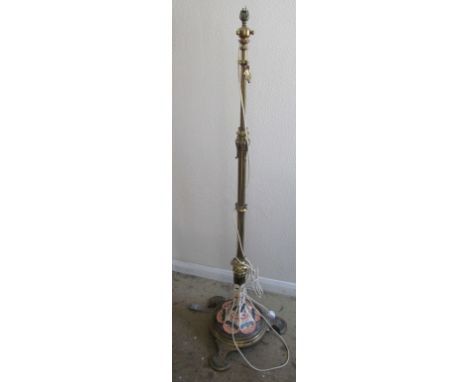An upstanding light with decorative base
