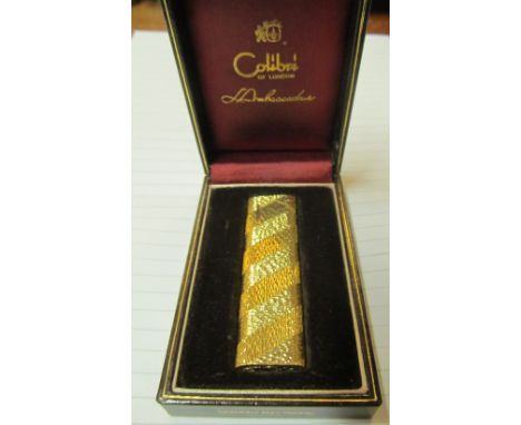 An 18ct two colour gold Colibri lighter c 1982 Ambassador Plezo in leather case and boxlighter weight 76.2g all in including 