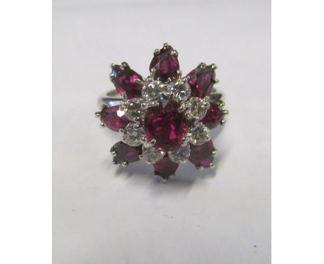 A ruby and diamond ring marked 18k 7.2g