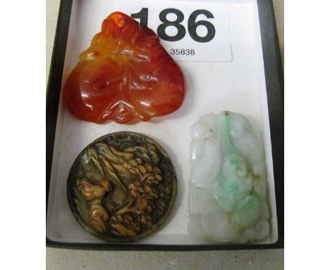 A jade pendant, carving and an agate fruit carving