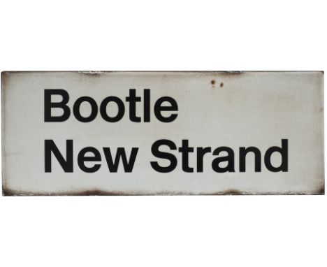 BR FF enamel station sign BOOTLE NEW STRAND. In very good condition and mounted on an original totem bracket. This sign dates