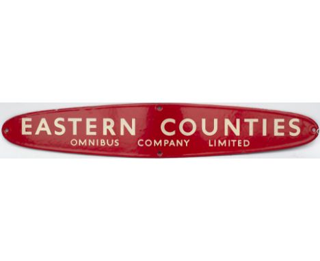 Motoring bus enamel timetable heading EASTERN COUNTIES OMNIBUS COMPANY LIMITED. Elliptical shaped red enamel measures 13.5in 