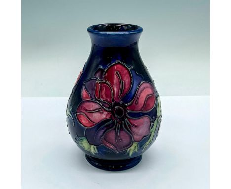 A small cobalt blue ground glazed vase with purple and maroon flowers. Excellent tube lining. Moorcroft and artist's markings