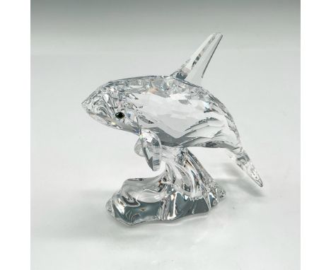 Part of the South Sea collection. Piece is created from clear faceted crystal with aqua crystal eyes, riding a smooth crystal