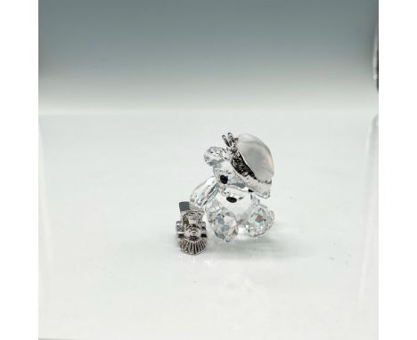 Part of the Ornaments theme group. Item is created from faceted clear crystal, jet crystal button eyes and nose wearing satin