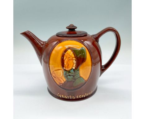 Brown glazed cover cafe pot in the Dame design. Features of a woman in a blue bonnet, holding a cup of tea. Royal Doulton bac