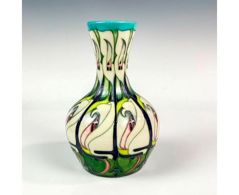 Unique repeated white lily tube line design; glaze interior. Artist signed and dated, Moorcroft Made In England backstamp. Th