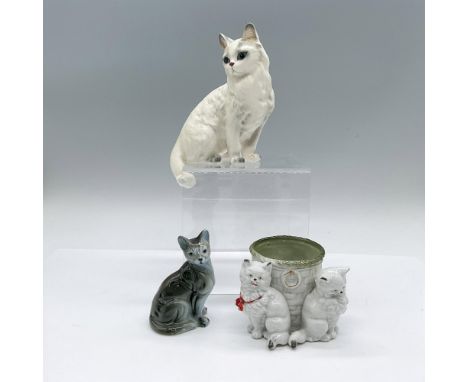Includes a glazed blue-gray seated cat, a basket cup with two white kittens, and a seated white Persian cat that is meant to 