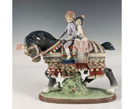 Glossy finish; two children in traditional clothing, riding an elegantly saddled horse. Lladro backstamp. This item has its o
