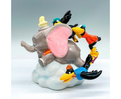 A delightful teapot modeled as the loveable Disney elephant, Dumbo, with the Crows handle. Disney impressed mark. This item h