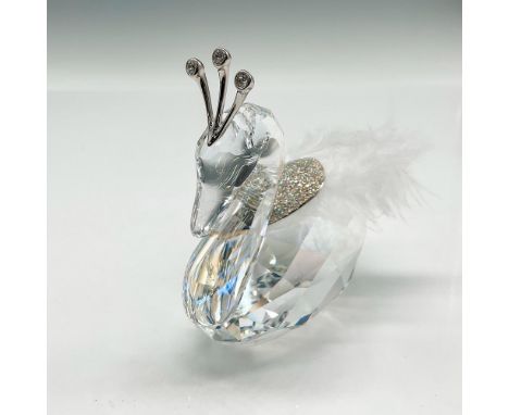 Figural is created from moonlight crystal with crushed crystal back and a delicate back feather. Rhodium crown with three cry