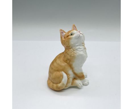 An adorable seated feline figure looking up. Royal Worcester backstamp. Issued: 1978Dimensions: 3.25"L x 2.75"W x 4"HManufact