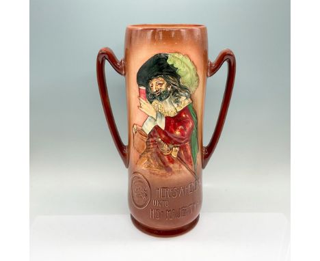 Full title: Here's A Health Unto His Majesty. Light brown glazed over a cream-colored ground twin handle vase. Embossed image