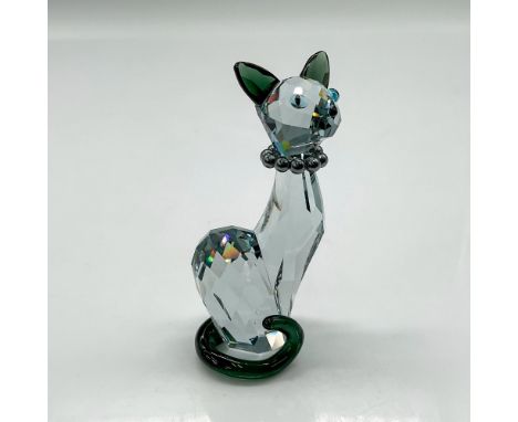 Figural created with contrasting ears and tail in the darker shades of Morion crystal with aquamarine crystal eyes and jet cr
