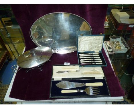 A quantity of silver plate including pair of fish servers with silver collars, mother of pearl knife, more Mother of Pearl kn