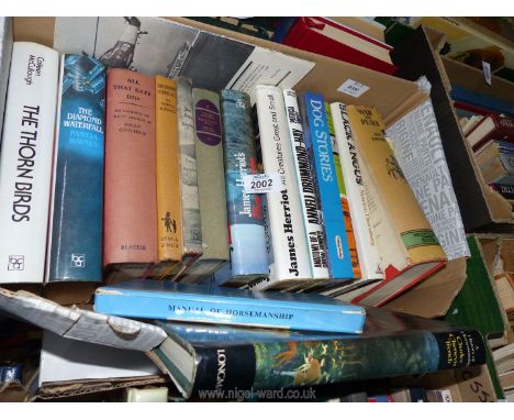 A box of books: War and Peace, Manual of Horsemanship etc.