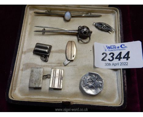 A small quantity of silver including stick pin brooches, pill box, cufflinks, etc.