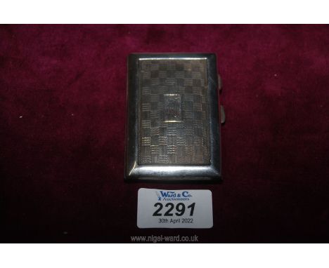 A Silver gilt Cigarette Case, Birmingham 1956, makers J.C. Ltd. with chequered engine turned decoration and initials engraved