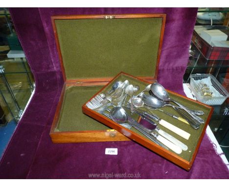 A cutlery box containing forks, teaspoons, Mother of Pearl handled cake slice, serving spoons etc.