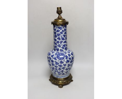 A 19th century Chinese blue and white ‘lotus’ vase, later converted into a brass lamp