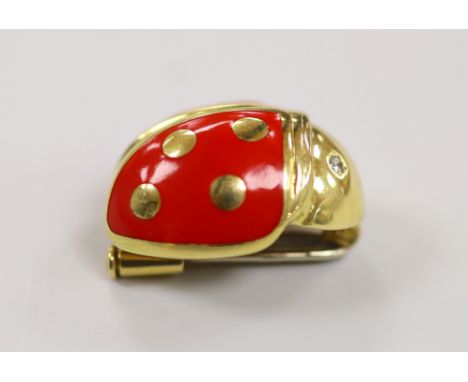 An 18ct gold, enamel and diamond chip set novelty clip brooch, in the form of a ladybird, by Mappin &amp; Webb?, 20mm, gross 