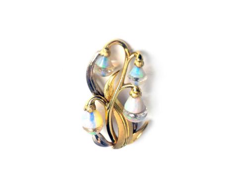 An 18ct yellow and white gold, opal and rock crystal brooch, of floral design, the flower buds made up of sectional opal pear