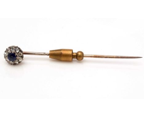 A sapphire and diamond tie pin, the sapphire and diamond cluster finial on 9ct yellow gold mount and pin, 6.1cms high, 3.2g g