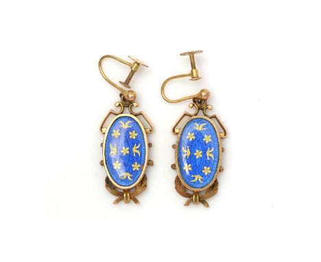 A pair of enamel and 9ct yellow gold earrings, the blue guilloche enamel plaques with gilt flower and bird design, within lea