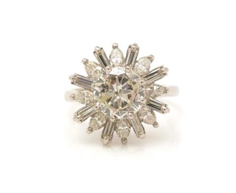 A diamond cluster ring, the brilliant cut diamond measuring 7.6 x 7.5 x 3.8mm weighing approximately 1.25carats, surrounded b