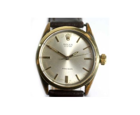 Rolex Oyster Precision: a gilt steel-cased wristwatch, the silvered baton dial with central seconds hand, fitted a 17-jewel m