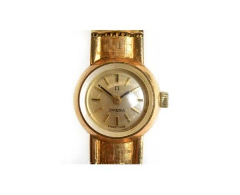 Omega: a lady's 9ct yellow gold cocktail watch, the silvered baton dial fitted 17-jewel manual wind movement, cal 650, serial