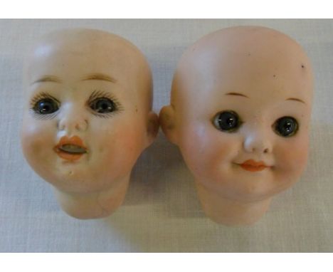 Early 20th cent Armand Marseille bisque 'googly eye' dolls head no 323 A8/0M & Hermann Steiner bisque dolls head