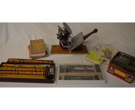 Adana "Five Three" printing press with a large quantity of accessories, including inks, tools, type, books, manuals etc