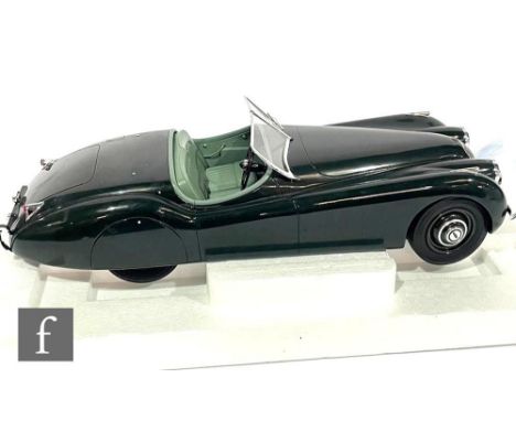 A 12Art 1001010 1:12 scale Jaguar XK120 OTS green 1953 diecast model car, boxed. 