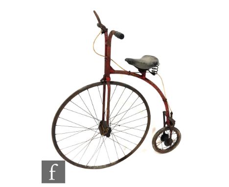 A child's penny farthing with Dunlop seat, height 98cm. 