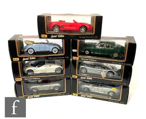 Seven Maisto 1:18 scale diecast model cars, to include McLaren F1, Porsche Boxster, Jaguar Mark II etc, all boxed. (7) 