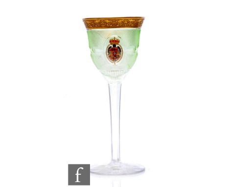 A late 19th Century Moser wine glass, the lipped ovoid bowl finely cut with strawberry diamond pattern below an acid cut and 