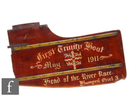 An early 20th Century teak and brass strip mounted boat rudder named 'First Trinity Boat May 1911 Head of the river race bump