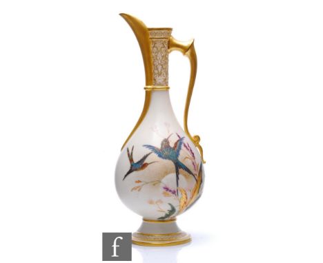 A large late 19th Century Royal Worcester shape 779 Aesthetic pedestal ewer decorated with two stylised hummingbird type bird