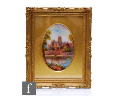 A framed Royal Worcester plaque hand painted by Rushton with a scene of Worcester Cathedral, signed, puce mark with date for 
