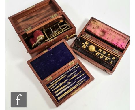 A Victorian mahogany cased shock machine, a cased hydrometer set and a cased set of drawing instruments. Please note the ther