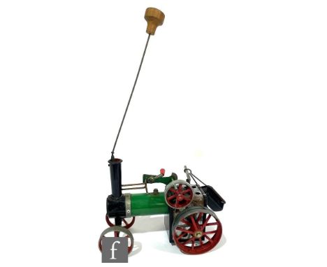 A Mamod live steam traction engine with burner tray, has been fired, unboxed. 