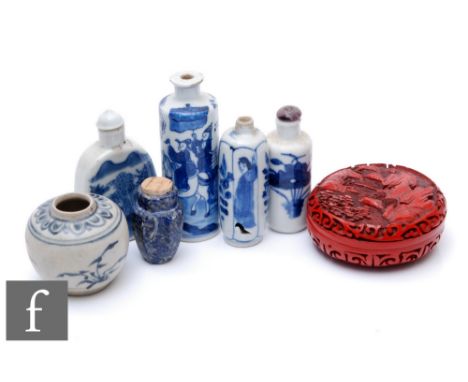 A collection of Chinese objects, to include four blue and white snuff bottles, a Lapiz Lazuli snuff bottle, a cinnabar lacque