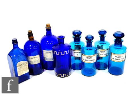 A pair of early 20th Century light blue chemist jars and stoppers, applied recessed labels, NAPHTOL B., PILULES DE CARB:FERR: