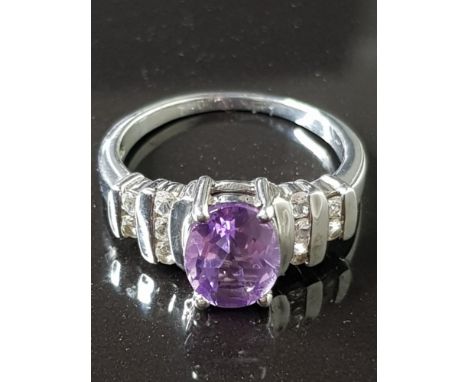 SILVER CZ AND AMETHYST RING 3.9G SIZE P