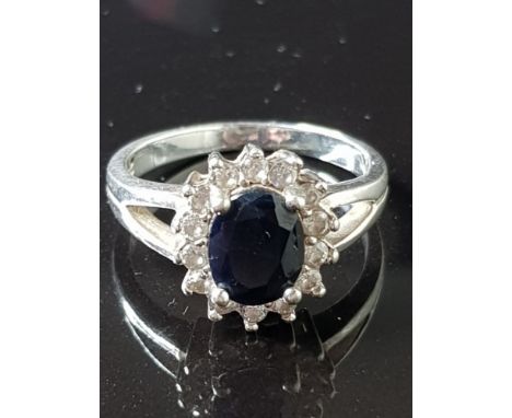 SILVER CZ AND SAPPHIRE RING 4.6G SIZE R